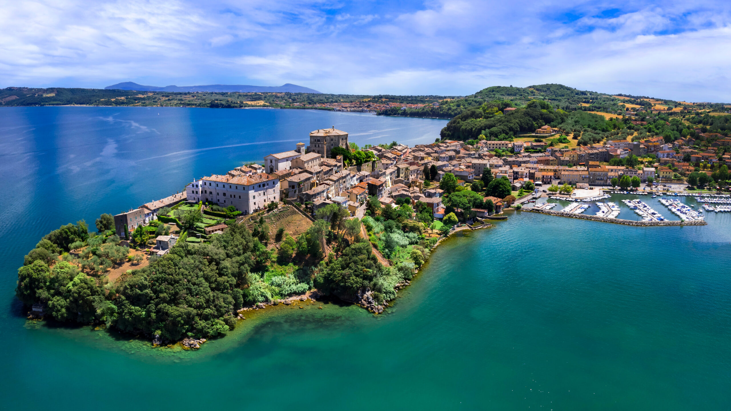 Scenic lakes of Italy - beautiful Bolsena. aerial view of Capodimonte medieval village. Viterbo province, Lazio region