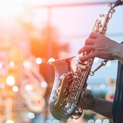 International jazz day and World Jazz festival. Saxophone, music instrument played by saxophonist player musician in fest.