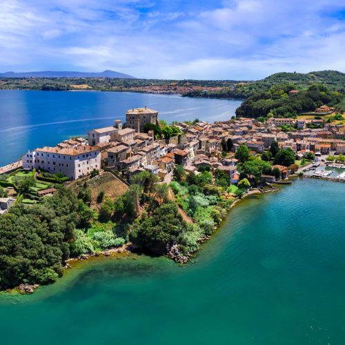 Scenic lakes of Italy - beautiful Bolsena. aerial view of Capodimonte medieval village. Viterbo province, Lazio region